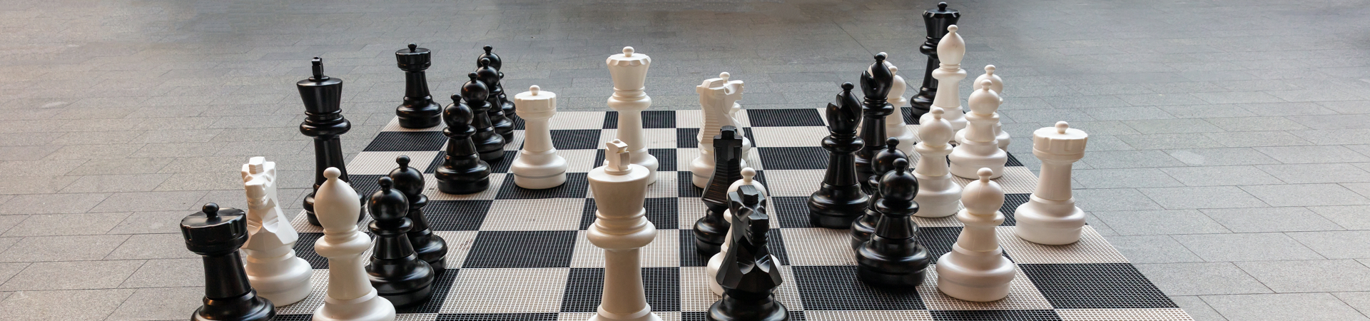 giant-chess-board-in-rotterdam-banner-background-FJYM9CB